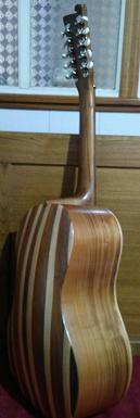 Chitarra battente (finished in 2012). Sides in cherry wood, slatted back plate, soundboard in spruce, 
                                    fingerboard in walnut, handle in chestnut. Shellac coating. 