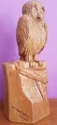 Owl. Sculpture in cherry wood.